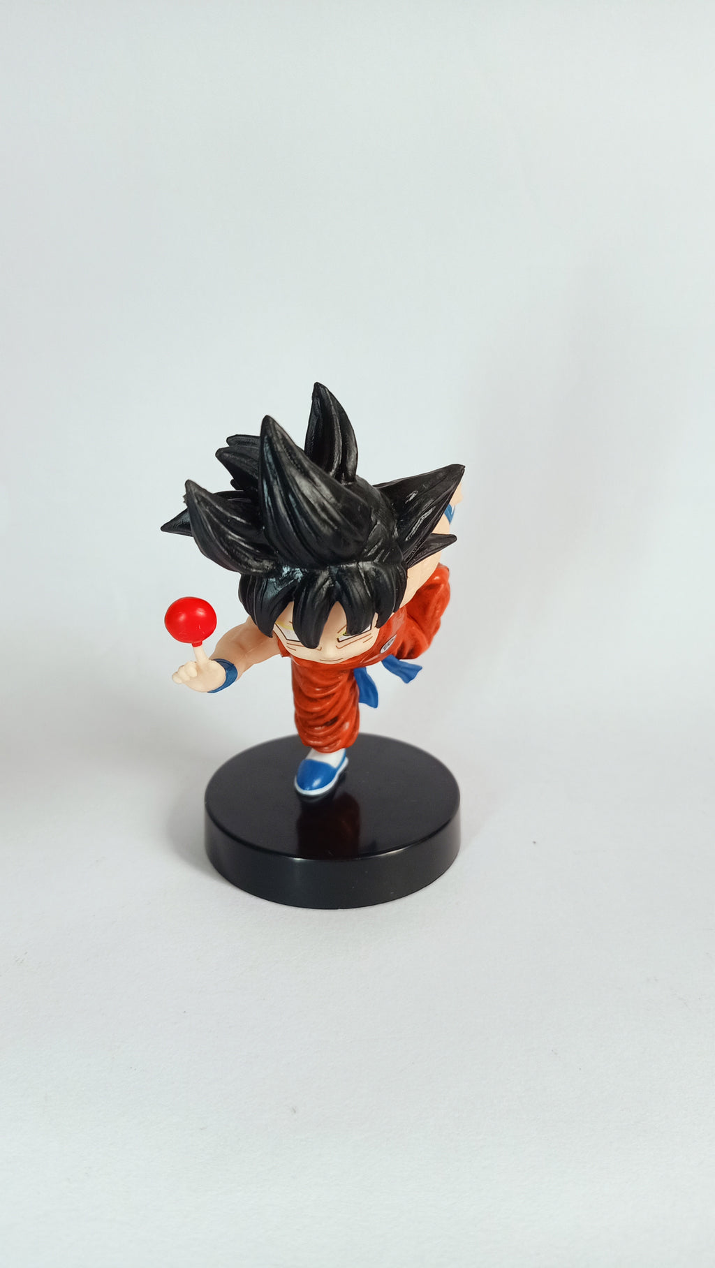 Dragon Ball Kid Goku Running with Candy Collectible Figure