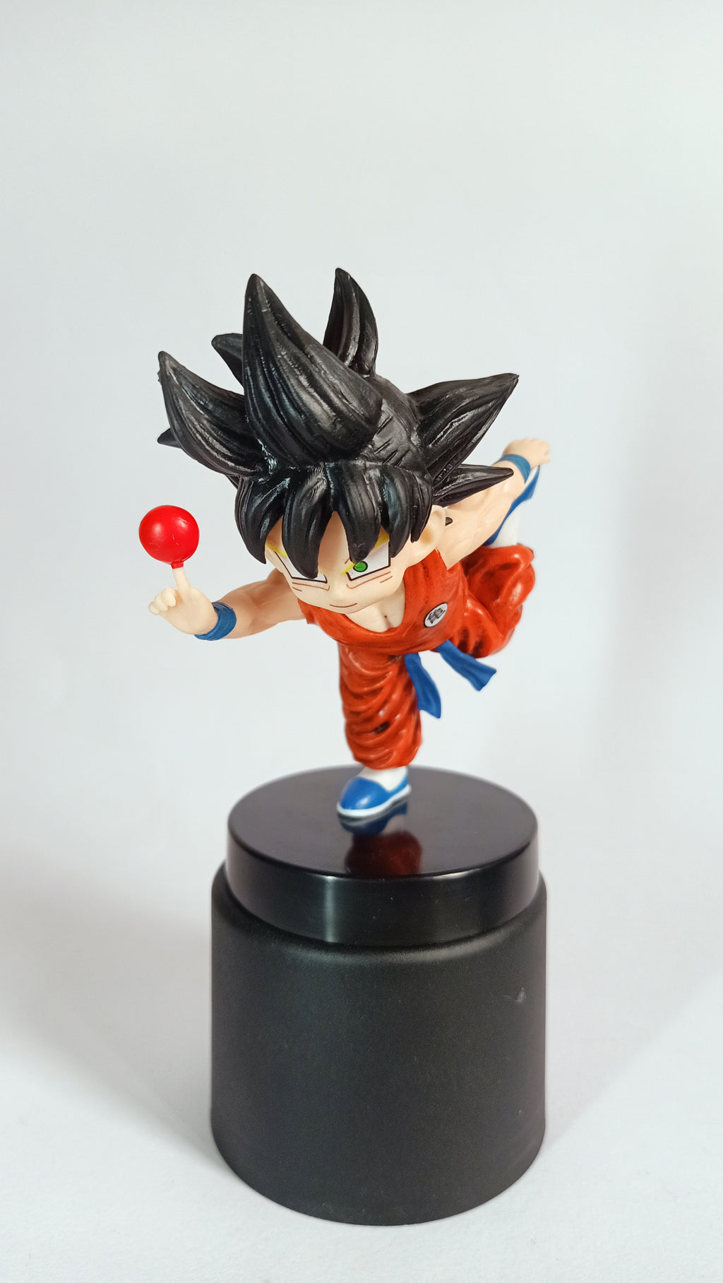 Dragon Ball Kid Goku Running with Candy Collectible Figure