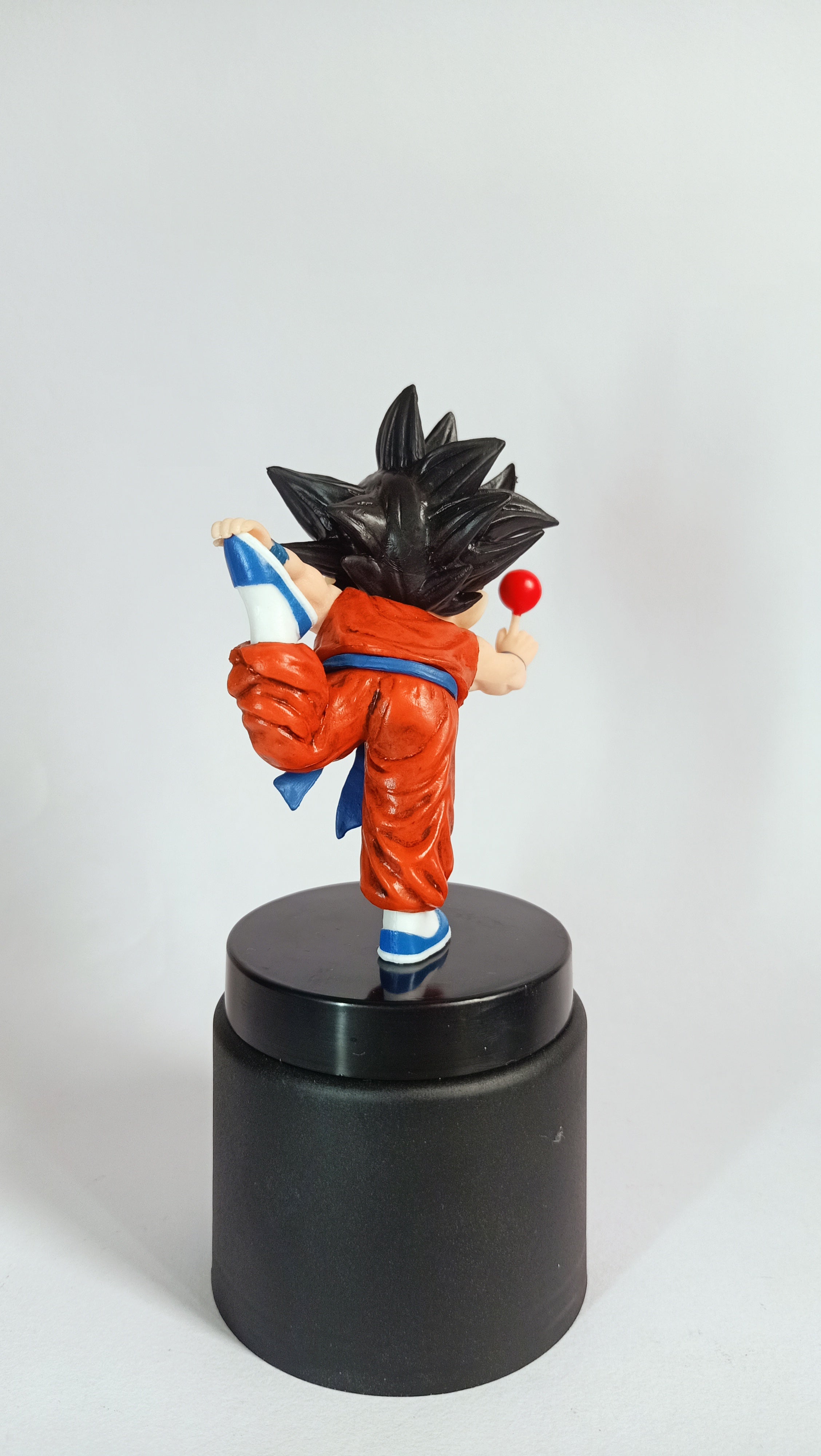 Dragon Ball Kid Goku Running with Candy Collectible Figure